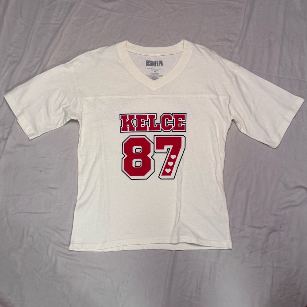 NFLPA- Swiftie Travis Kelce White Graphic Tee
